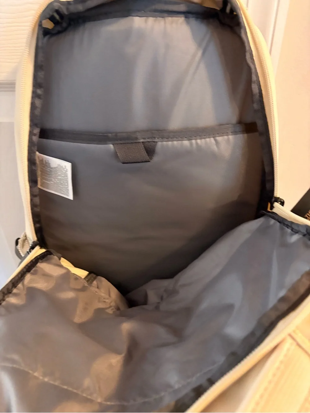 The North Face sleek cream